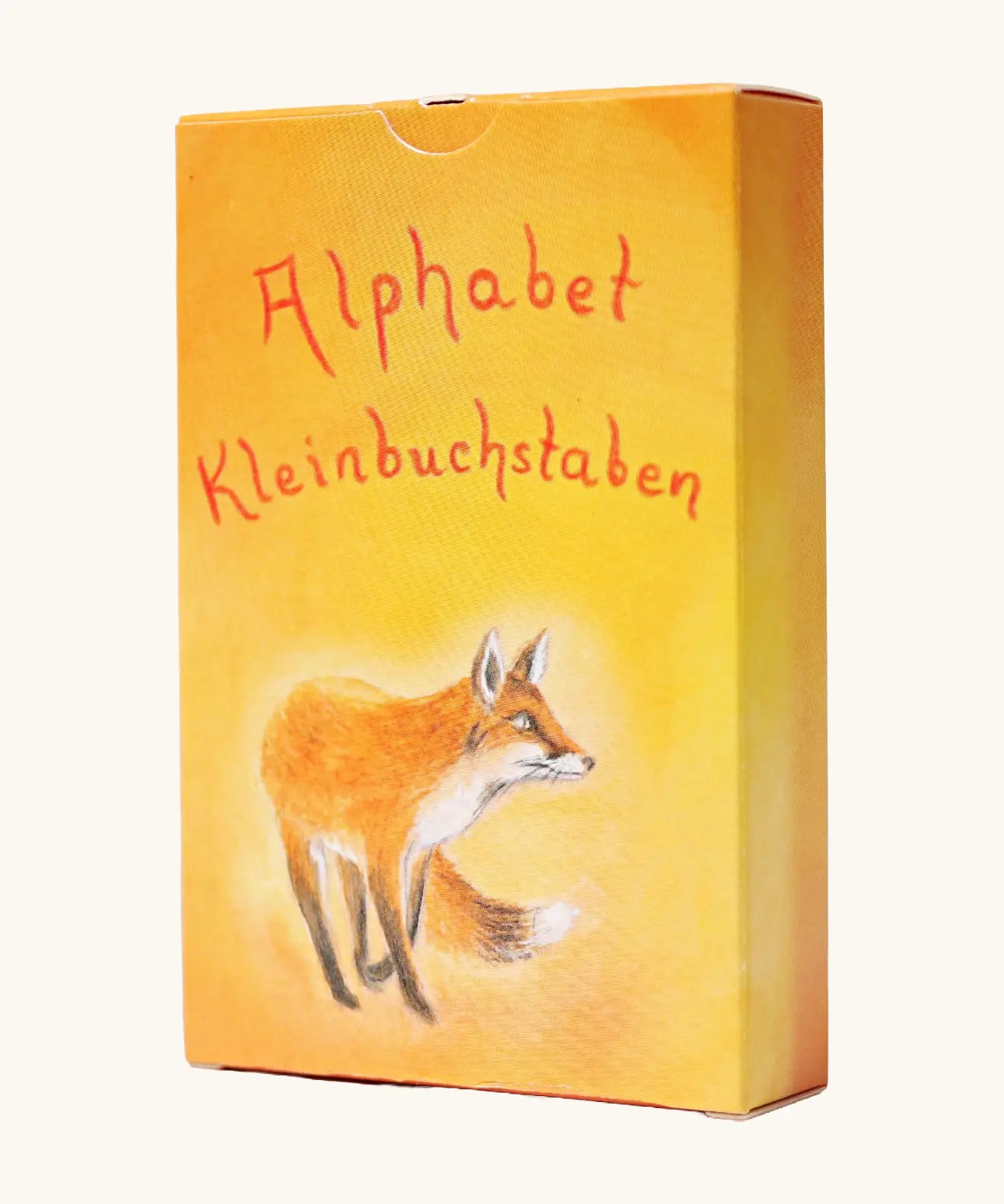Grimms letter supplementary card set for learning the alphabet, phonics and spelling out simple words. Showing a warm orange yellow packaging with a fox illustration 