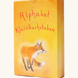Grimms letter supplementary card set for learning the alphabet, phonics and spelling out simple words. Showing a warm orange yellow packaging with a fox illustration 