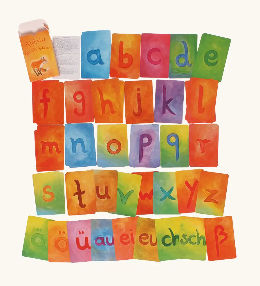 Row of the cards with letters of the alphabet from the Grimms supplementary letter set. 