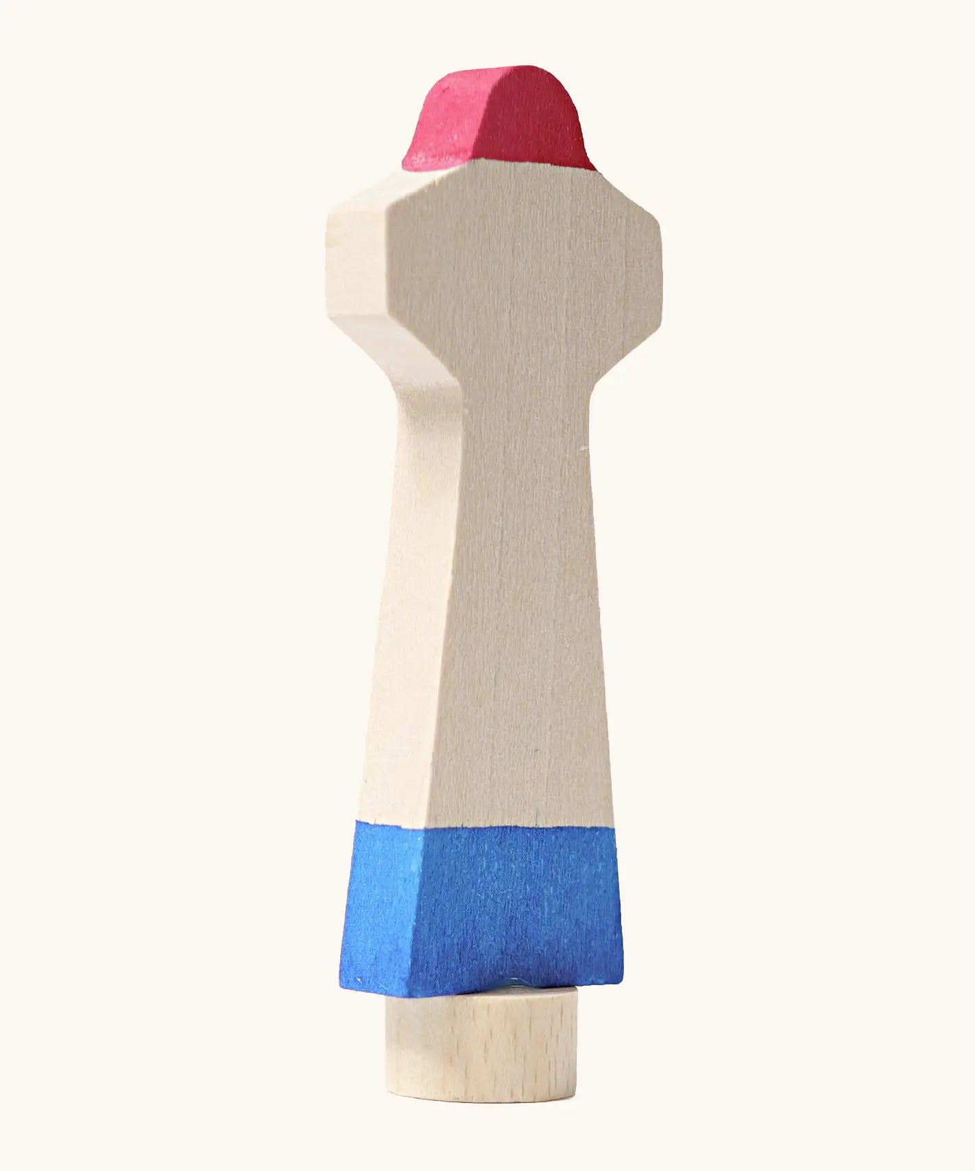 Side of Grimm's handcrafted wooden lighthouse figure showing thickness of the figure