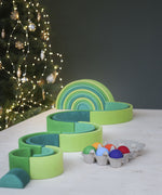 A winding ball run made from the Grimms meadow large green wooden rainbow set available at Babipur