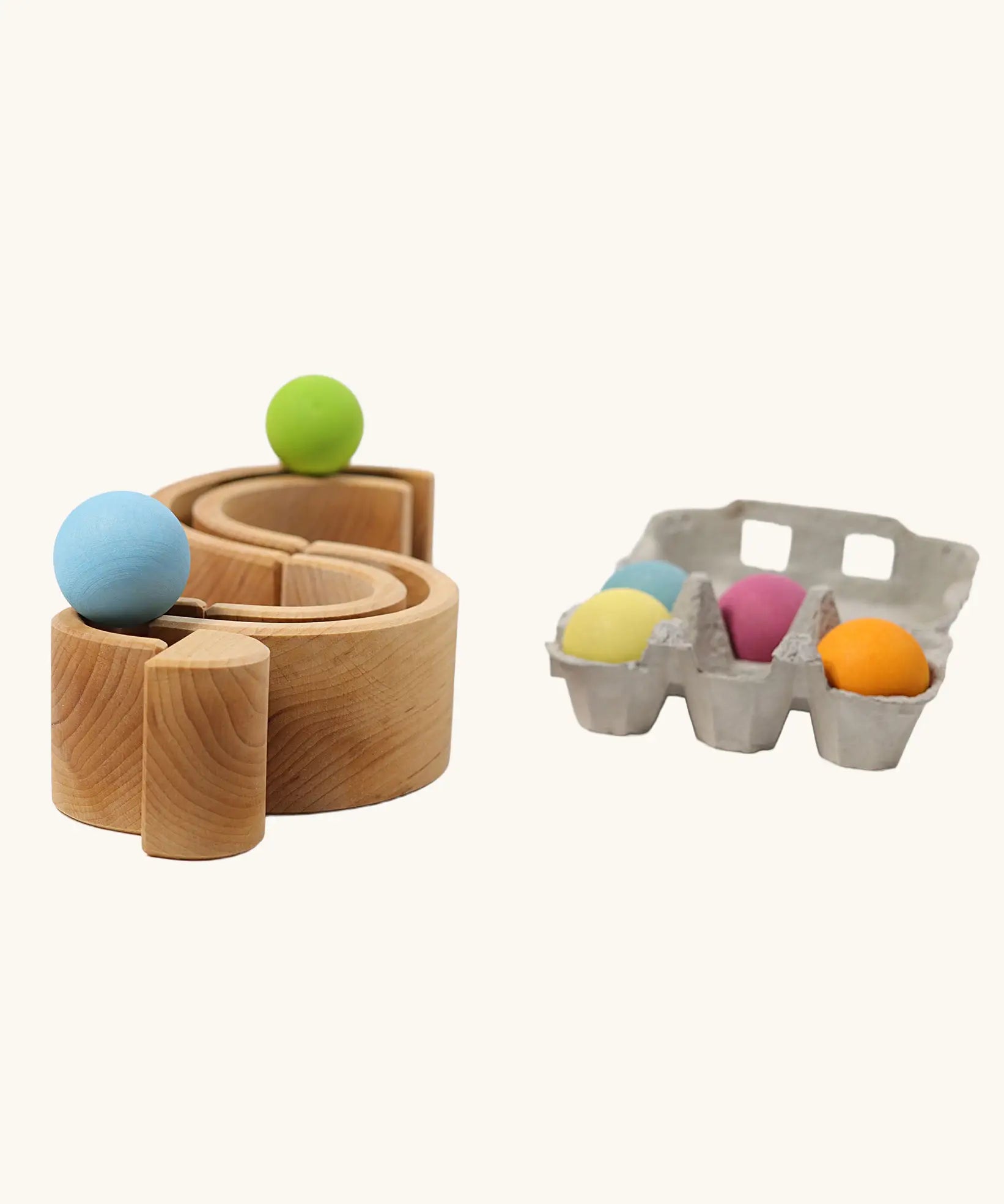 Grimm's 6 piece medium natural rainbow set up as a ball run.