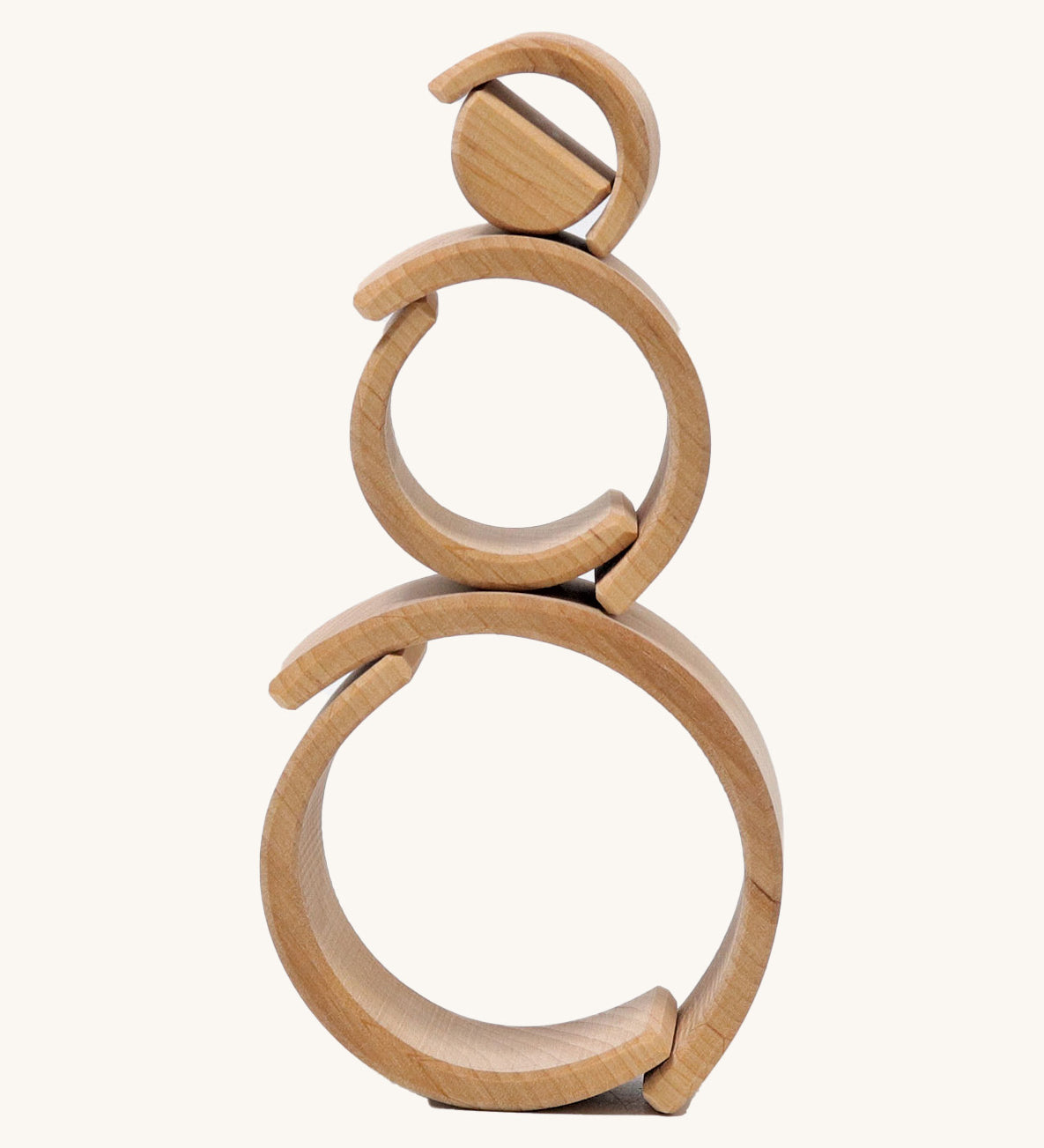 A mini stack using the pieces from  Grimms natural wooden rainbow stacking toy available at Babipur. 