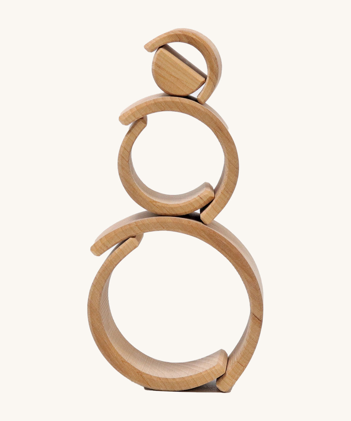 A mini stack using the pieces from  Grimms natural wooden rainbow stacking toy available at Babipur. 