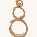 A mini stack using the pieces from  Grimms natural wooden rainbow stacking toy available at Babipur. 