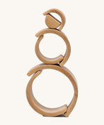 A mini stack using the pieces from  Grimms natural wooden rainbow stacking toy available at Babipur. 