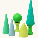 Grimms handcrafted wooden forest set in shades of green. Includes different sized cones, bobbins and a ball 