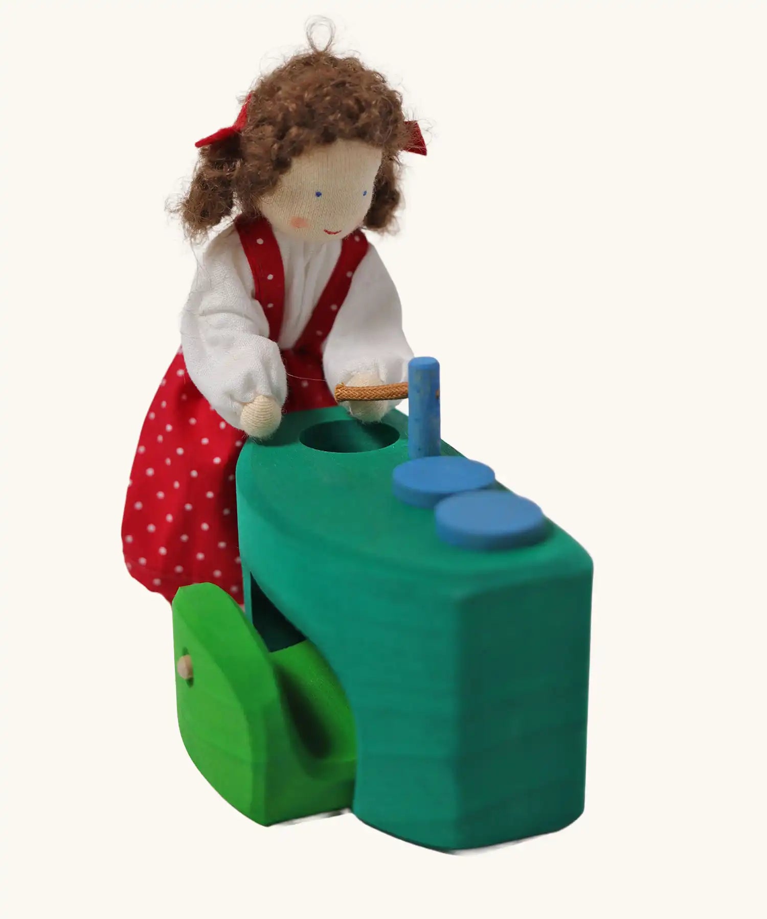 Grimm's blue and green mobile dolls home wooden toy play set sink with doll placed besides it.
