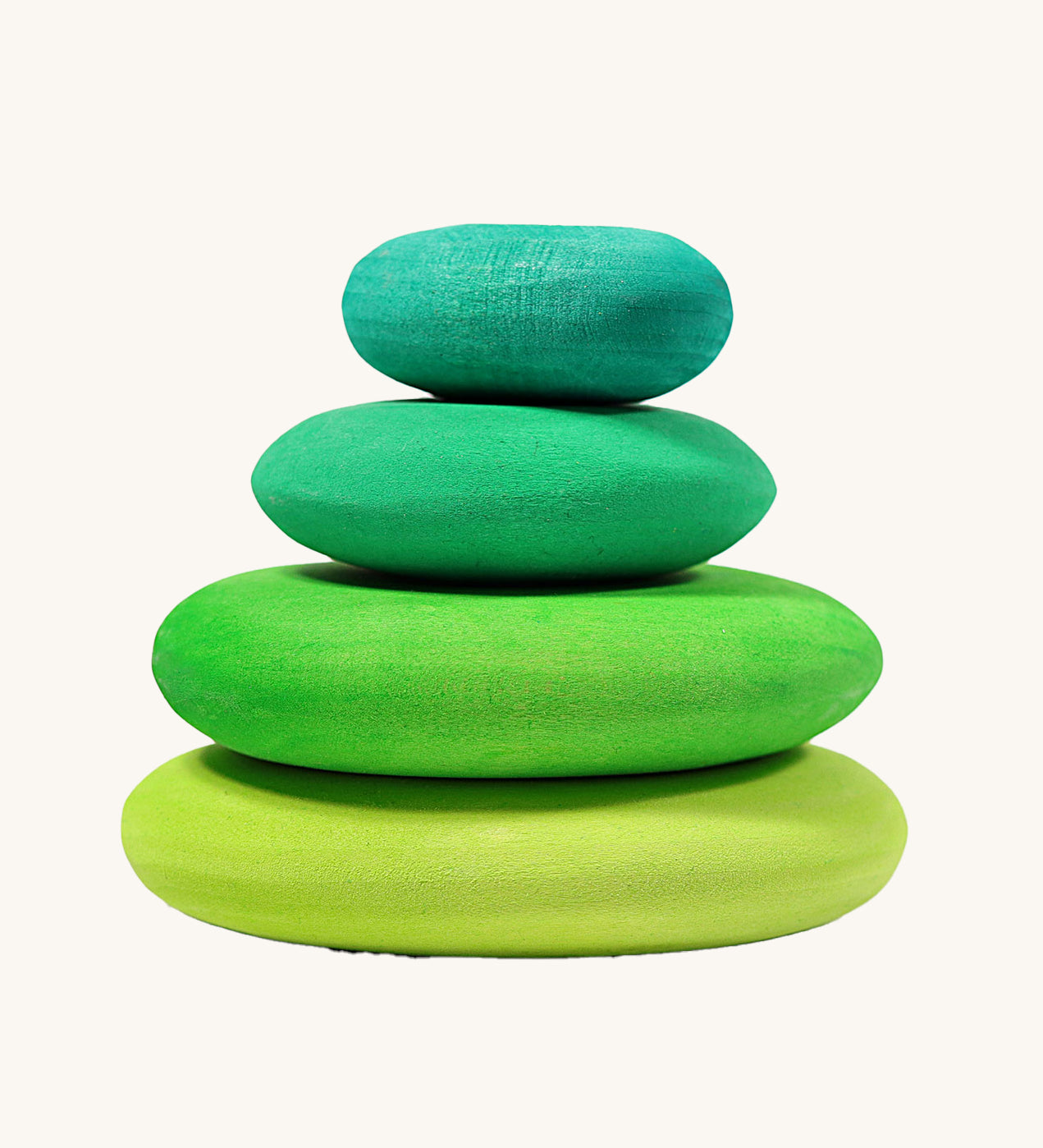 A set of 4 Grimm's wooden pebbles is a moss green colourway. 