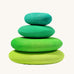 A set of 4 Grimm's wooden pebbles is a moss green colourway. 