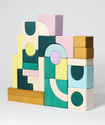 A simple build in a abstract style made from different hand carved Grimms movement building pieces