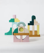 A simple build made from different hand carved Grimms movement building pieces