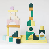 A simple stack made from the Grimms movement hard carved pieces standing in a yellow frame