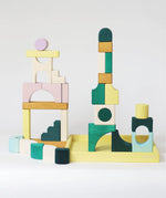 A simple stack made from the Grimms movement hard carved pieces standing in a yellow frame