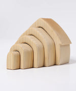 Back of Grimms handcrafted wooden natural house pieces showing each piece slotted into each other 