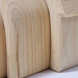 Grimms handcrafted wooden natural house pieces showing close up of grain detail on each piece