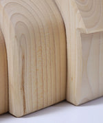 Grimms handcrafted wooden natural house pieces showing close up of grain detail on each piece