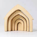Front of Grimms handcrafted wooden natural house pieces showing each piece slotted into each other 