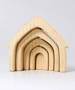 Front of Grimms handcrafted wooden natural house pieces showing each piece slotted into each other 