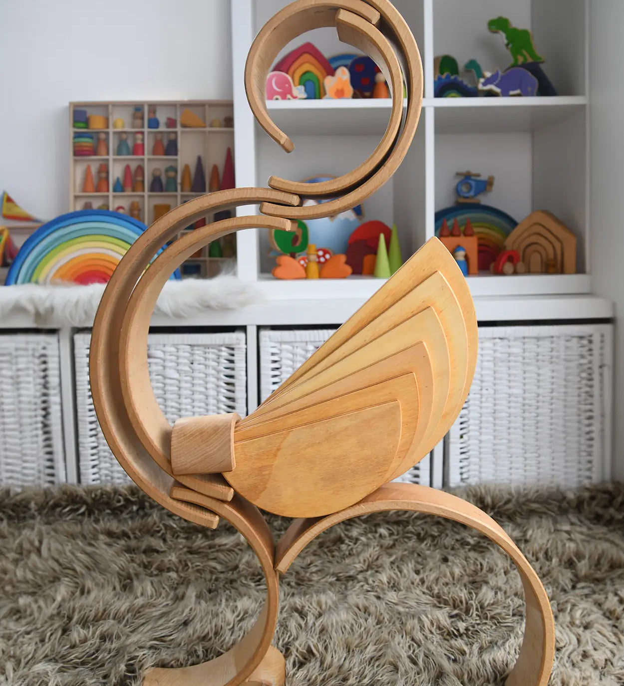 A complex stack structure made from Grimm's wooden natural semi circle and arch pieces