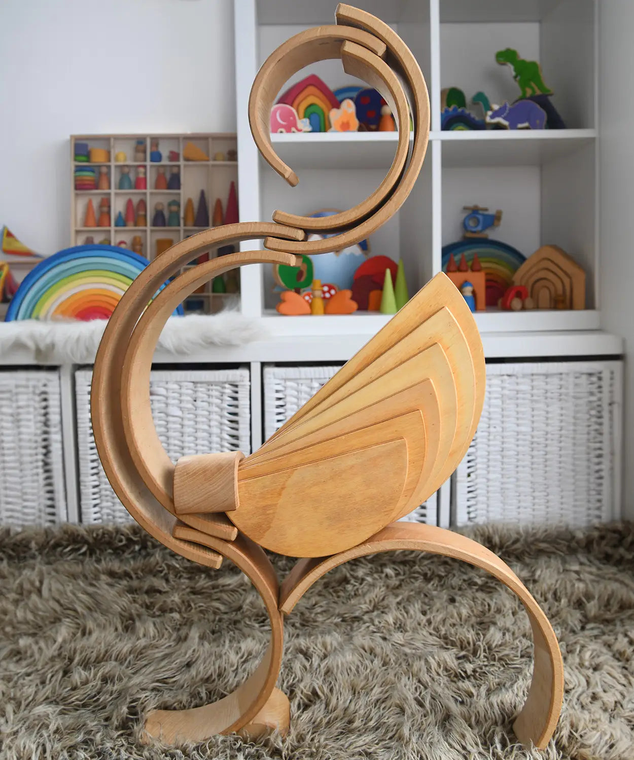 A complex stack structure made from Grimm's wooden natural semi circle and arch pieces