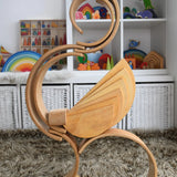 A complex stack structure made from Grimm's wooden natural semi circle and arch pieces