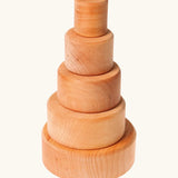 Stack of Grimms natural wooden bowls