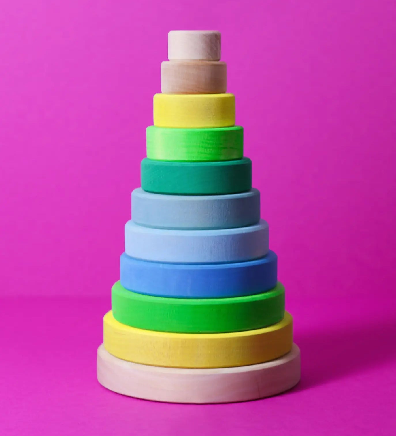 Grimms conical tower in a neon green colour way. Includes 11 handcrafted wooden pieces for building and stacking