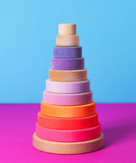 Grimms handcrafted wooden conical tower in neon pink colour way and a natural base. 