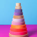 Grimms handcrafted wooden conical tower in neon pink colour way and a natural base. 