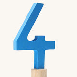 A blue coloured number four Grimm's Decorative Number figure to fit a Grimm's celebration ring. These numbers are part of a large range of decorative figures available here at Babipur. 