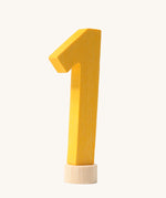 A yellow coloured number one Grimm's Decorative Number figure to fit a Grimm's celebration ring. These numbers are part of a large range of decorative figures available here at Babipur. 