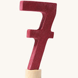 A burgundy coloured number seven Grimm's Decorative Number figure to fit a Grimm's celebration ring. These numbers are part of a large range of decorative figures available here at Babipur. 