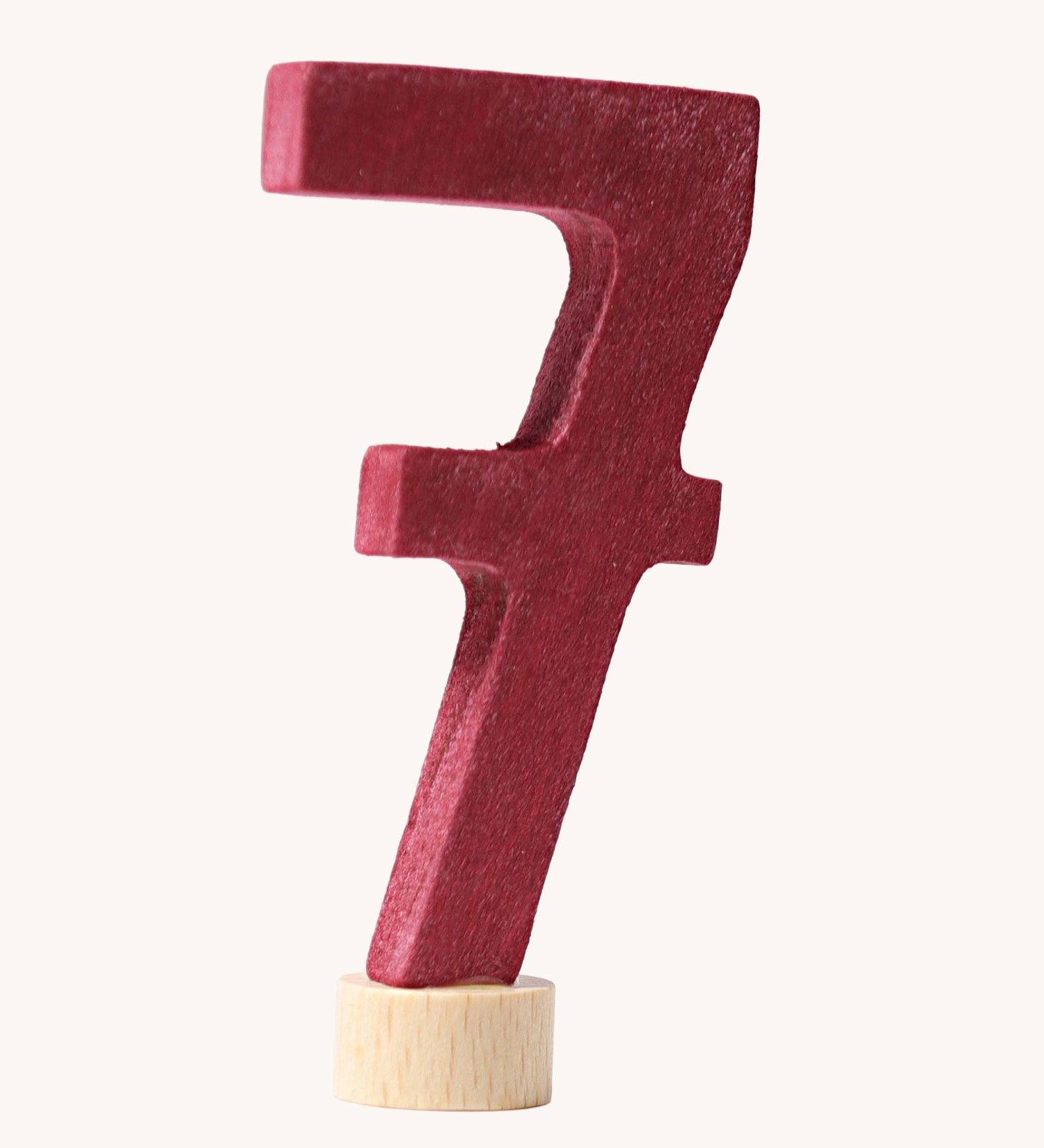 A burgundy coloured number seven Grimm's Decorative Number figure to fit a Grimm's celebration ring. These numbers are part of a large range of decorative figures available here at Babipur. 