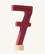 A burgundy coloured number seven Grimm's Decorative Number figure to fit a Grimm's celebration ring. These numbers are part of a large range of decorative figures available here at Babipur. 