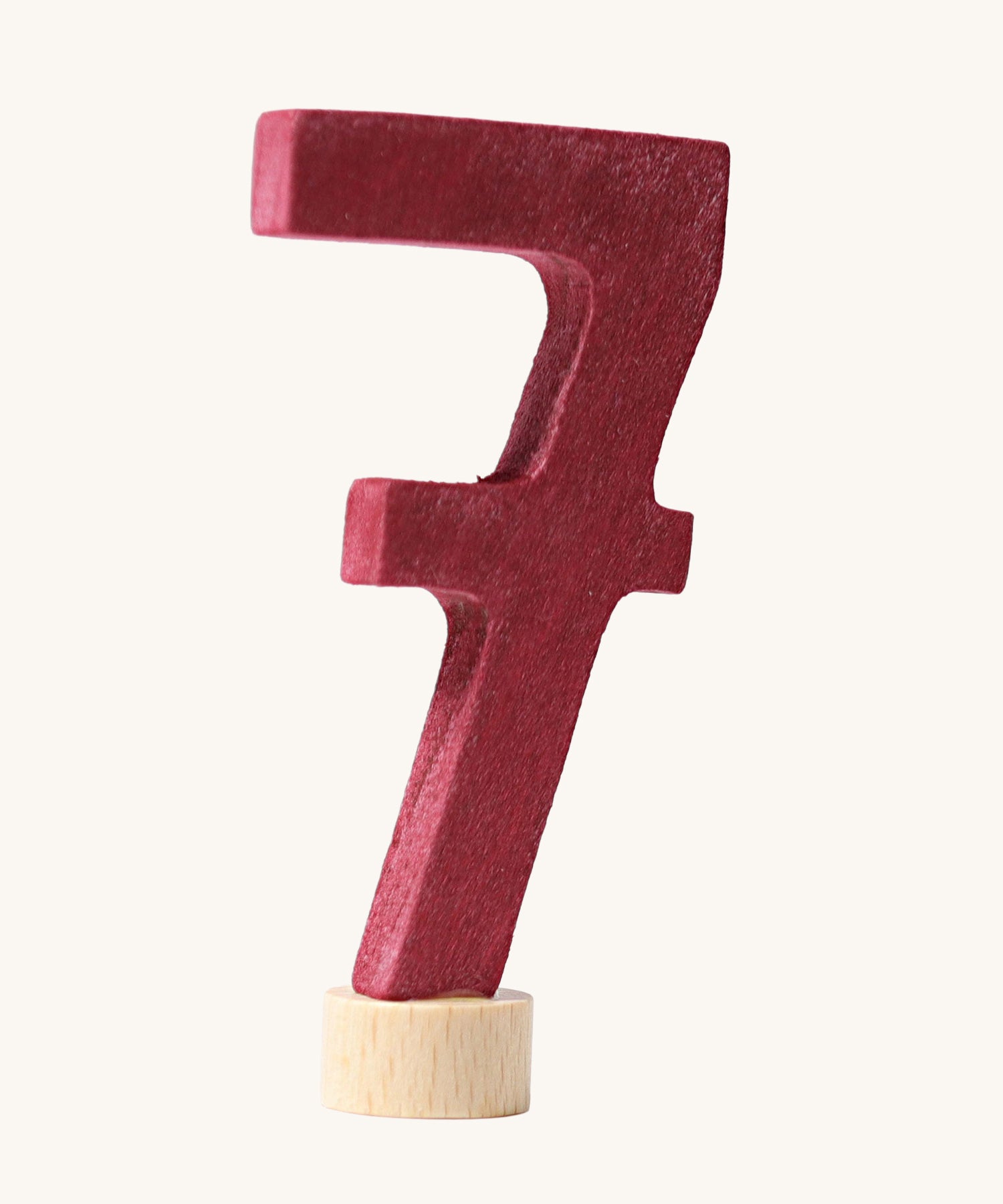 A burgundy coloured number seven Grimm's Decorative Number figure to fit a Grimm's celebration ring. These numbers are part of a large range of decorative figures available here at Babipur. 