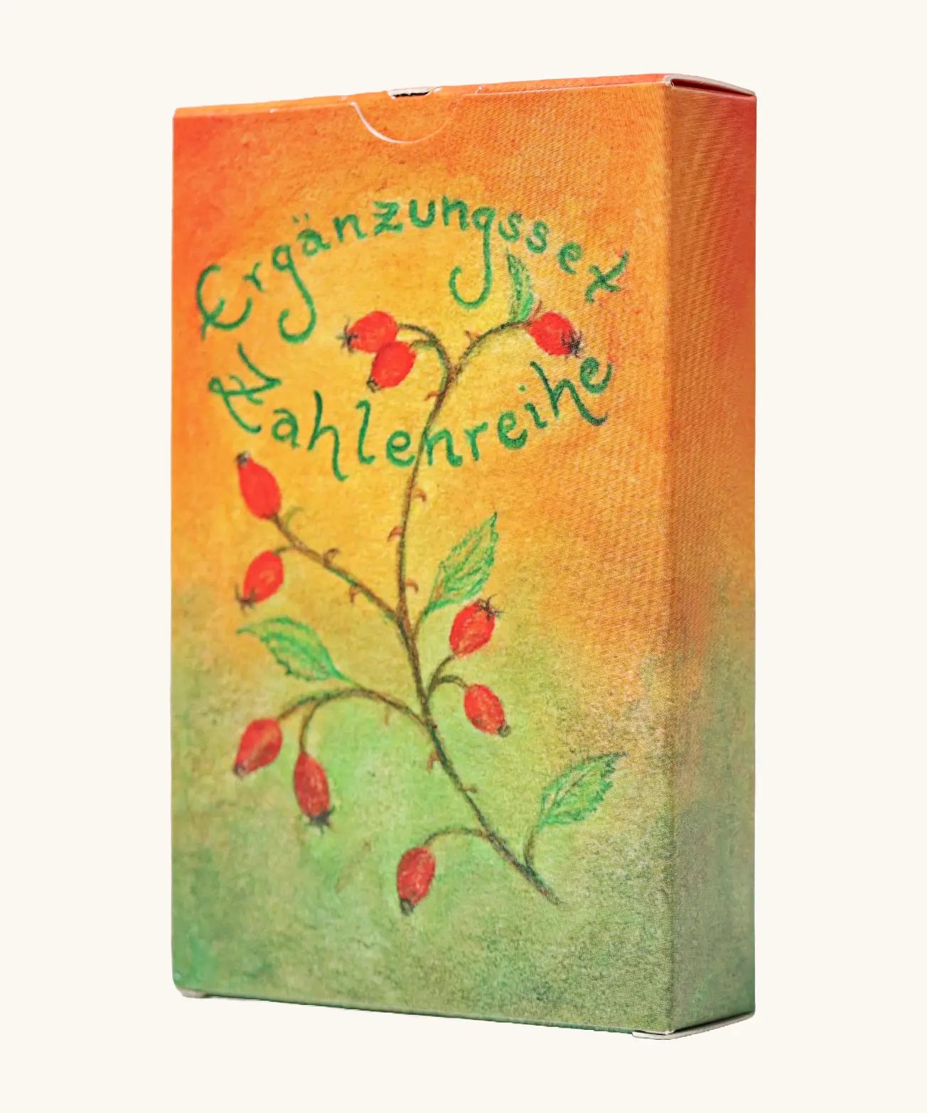 Grimms number supplementary card set for learning about numbers and maths. Showing a warm orange yellow packaging with illustration of strawberries