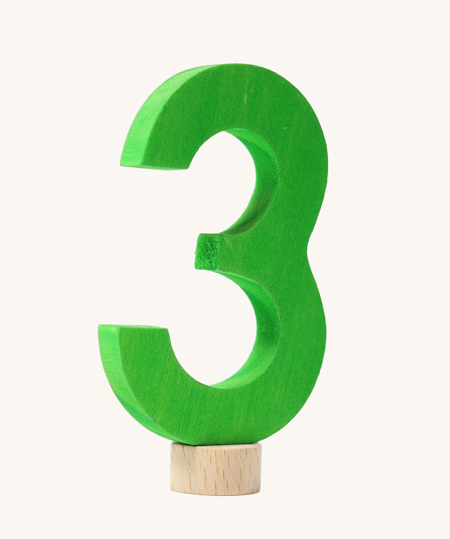 A green coloured number three Grimm's Decorative Number figure to fit a Grimm's celebration ring. These numbers are part of a large range of decorative figures available here at Babipur. 