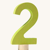 A green coloured number two Grimm's Decorative Number figure to fit a Grimm's celebration ring. These numbers are part of a large range of decorative figures available here at Babipur. 