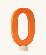 An orange coloured number zero Grimm's Decorative Number figure to fit a Grimm's celebration ring. These numbers are part of a large range of decorative figures available here at Babipur. 