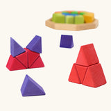 Grimm's octagon puzzle. 32 piece chunky triangle blocks in a wooden storage display tray. Small stacks created using the blocks.
