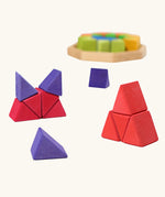 Grimm's octagon puzzle. 32 piece chunky triangle blocks in a wooden storage display tray. Small stacks created using the blocks.
