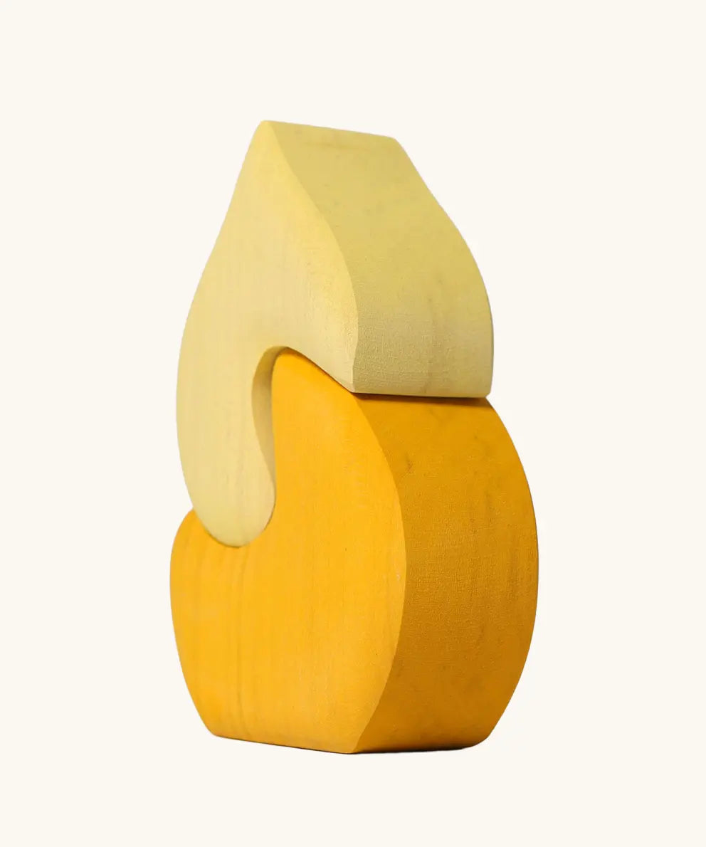 Back of the Grimm's yellow onion house stacking toy.