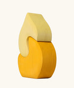 Back of the Grimm's yellow onion house stacking toy.