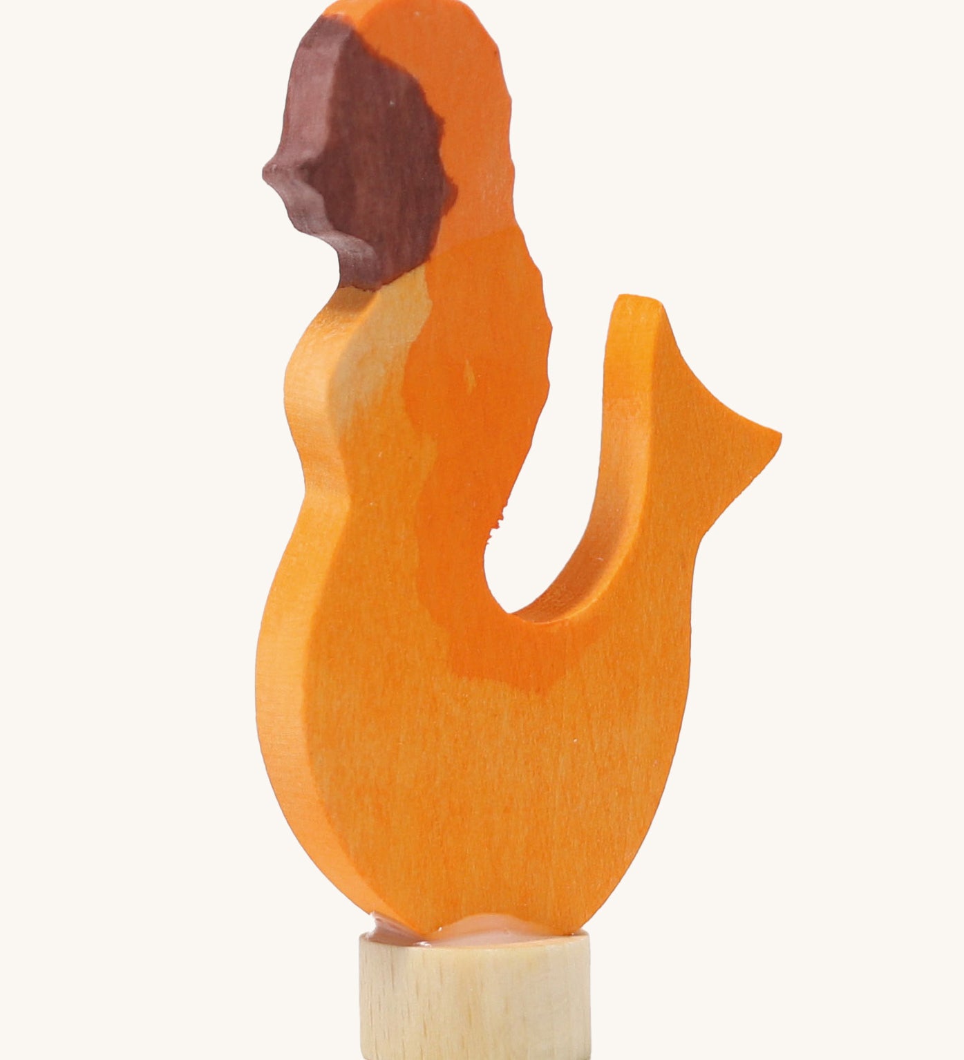 A Grimms wooden mermaid decorative figure in orange. Features a small base stand to slot in the celebration ring