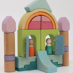A beautiful house play scene created by using the Grimm's Cloud Play set. The wooden tray base has been used as the house foundation