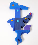 Blue and purple pieces from the Grimm's orient sparkling building set wooden toy.