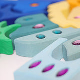 Close up of the sides of the blocks from the Grimm's orient sparkling building set wooden toy.