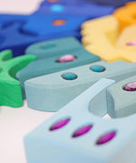 Close up of the sides of the blocks from the Grimm's orient sparkling building set wooden toy.