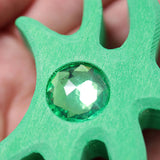 Close up of sparkly gem on one of the pieces from Grimm's orient sparkling building set wooden toy.